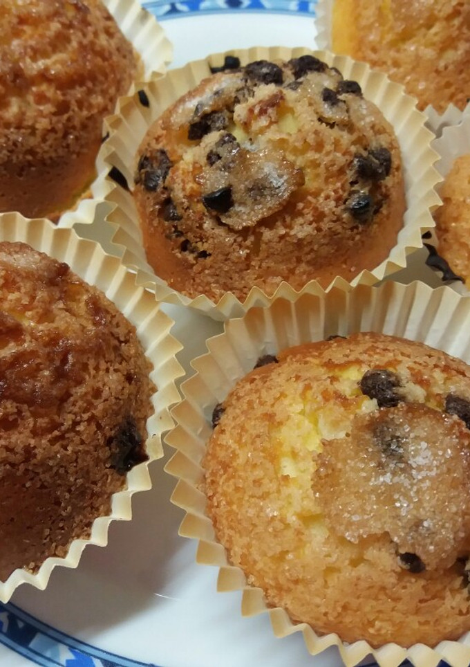 Una foto de Magdalenas con pepitas de chocolate y rellenas con nutella