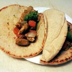 A picture of Curry Chicken Pitas.