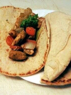 A picture of Curry Chicken Pitas.