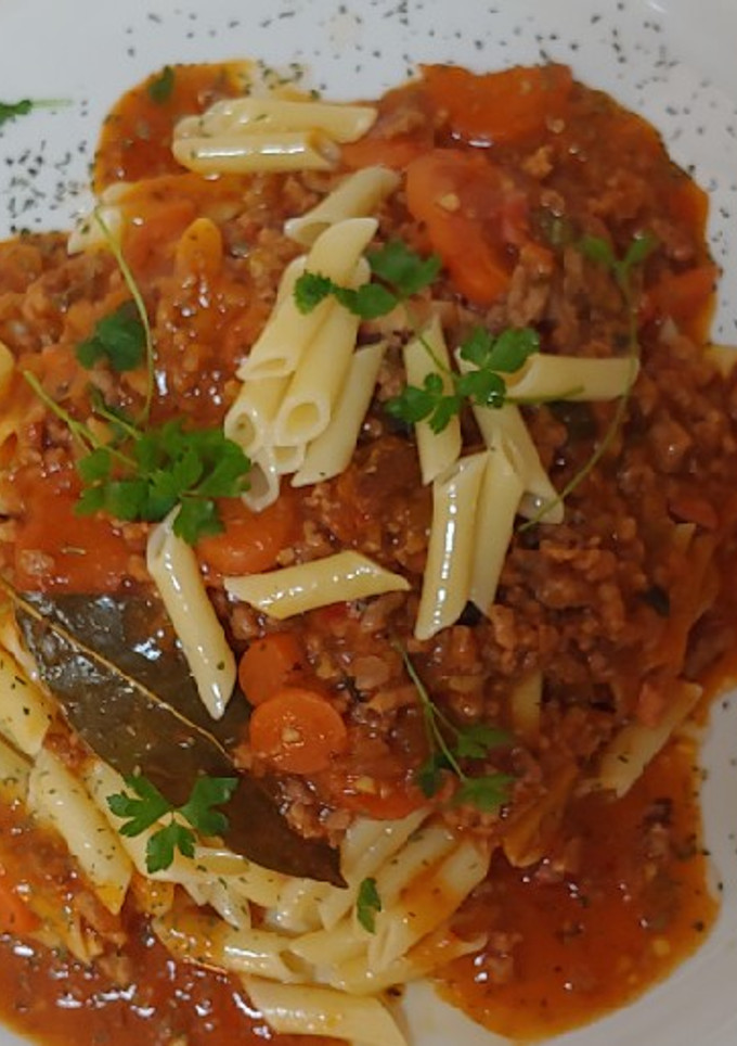 Una foto de Macarrones con boloñesa mixta