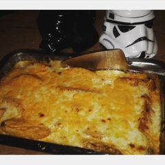 A picture of Cheesy Fish Finger and chips bake.