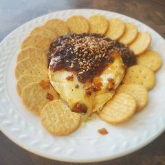 A picture of Brad's baked brie w/ caramelized onion chutney.