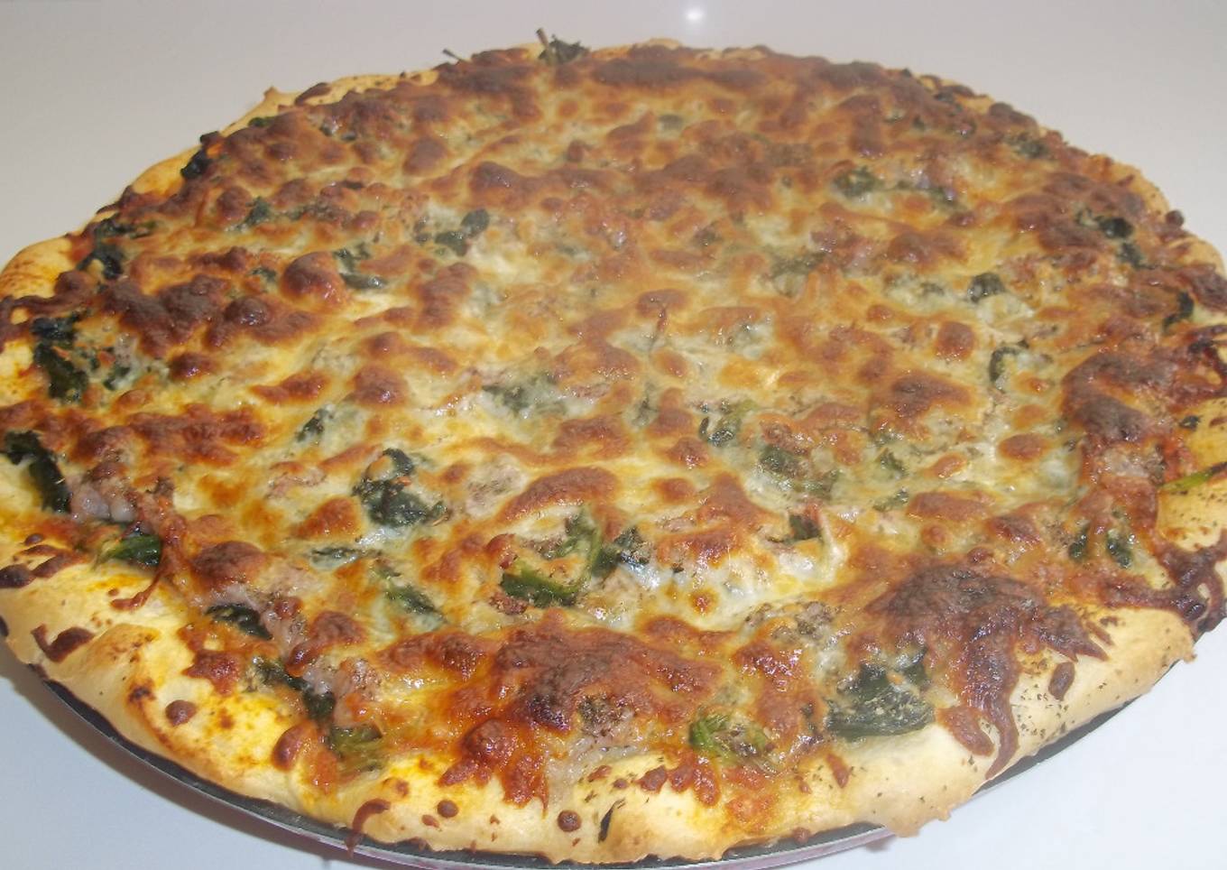 Pizza de espinacas y beicon