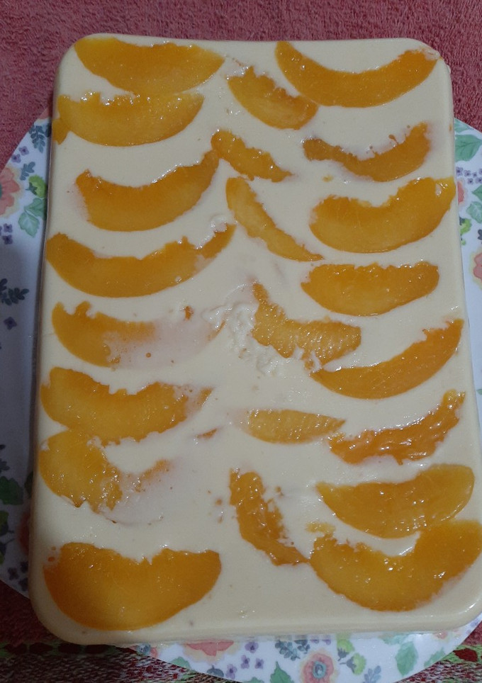 Una foto de Gelatina de leche y durazno paso a paso
