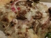 A picture of cheesesteak pizza