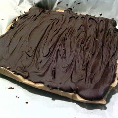 A picture of chocolate covered peanut butter fudge.