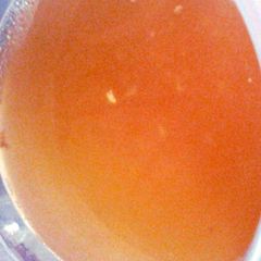 A picture of sinus saver ginger lemon honey broth.