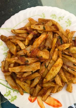 A picture of Fries in Garlic dhania Barbecue sauce.