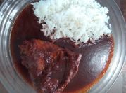 Una foto de barbacoa de pollo enchilado