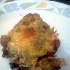A picture of Cheesy Salami bread & corned beef w scrambled eggs!.
