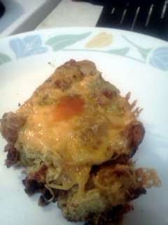 A picture of Cheesy Salami bread & corned beef w scrambled eggs!.