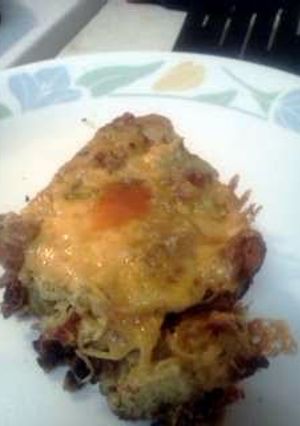 A picture of Cheesy Salami bread & corned beef w scrambled eggs!.