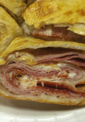 A picture of Stromboli/calzone (meat and cheese).