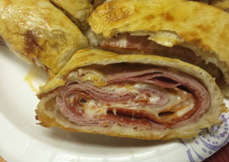 Recipe of Super Quick Stromboli/calzone (meat and cheese)
