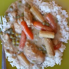 A picture of Crockpot mushroom ranch chicken over rice.
