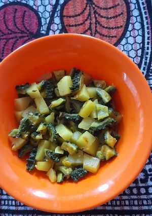 A picture of Bitter Gourd Green Mango Curry.