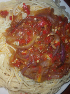 A picture of Spaghetti with sauce.