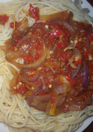 A picture of Spaghetti with sauce.