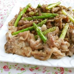 A picture of Pork and Asparagus with Butter Ponzu Sauce.