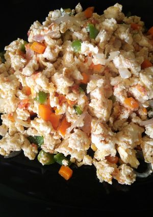 A picture of Scrambled vegetable fried eggs.