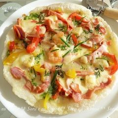 A picture of Mochi Pizza Made in a Frying Pan.