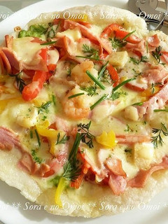 A picture of Mochi Pizza Made in a Frying Pan.