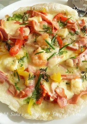 A picture of Mochi Pizza Made in a Frying Pan.