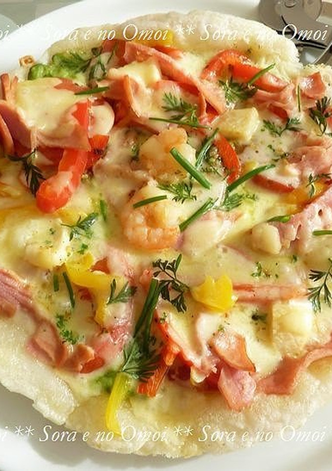 A picture of Mochi Pizza Made in a Frying Pan.
