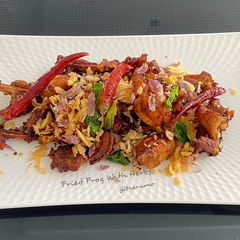 A picture of Fried Frog With Herbs.