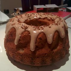 A picture of Cinnamon apple bundt cake with cinnamon icing.