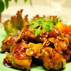 A picture of Chicken with Balsamic Vinegar Sauce and Slivered Almonds.