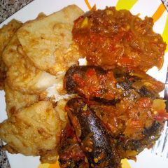 A picture of Fried yam with egg and fish sauce.