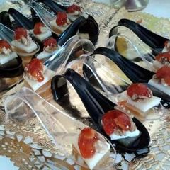 A picture of Spoons of Manchego, jelly Quince, Pecans and Tomato Jam.