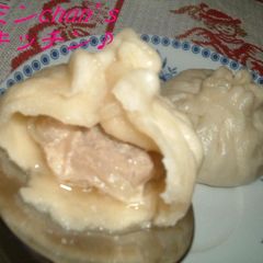 A picture of Juicy Homemade Xiaolongbao (Chinese Dumplings).