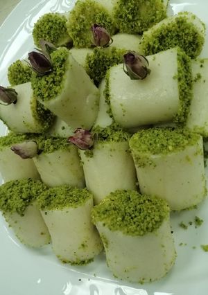 A picture of Cheesy roll with Pistachio.
