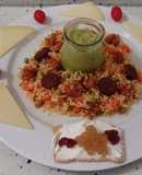 Arroz tres delicias, aperitivos de queso y guacamole