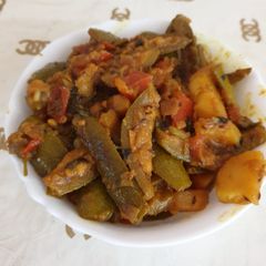 A picture of Pointed gourd and potato subji.