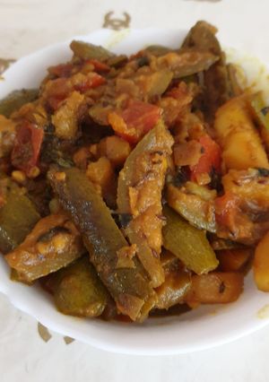 A picture of Pointed gourd and potato subji.