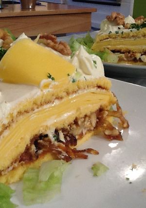 Una foto de Pionono relleno con quesos