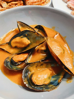 Una foto de Mejillones en salsa de pimentón