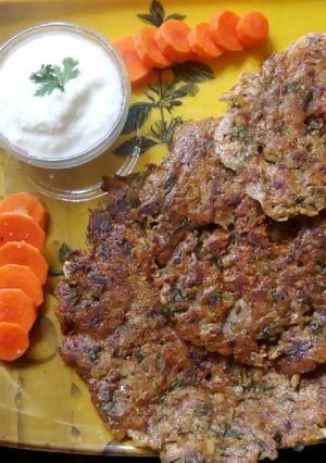 A picture of Leftover moong dal rice thalipeeth.