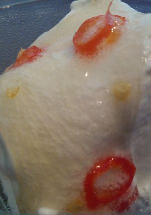 A picture of Hot chilly syrup on ice cream.