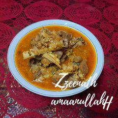 A picture of Creamy Mutton Masala with Poppy Seeds.