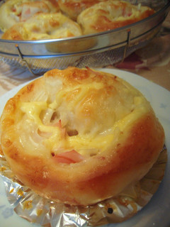 A picture of Cheesy Bread with Ham & Onion.