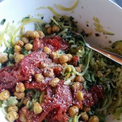 A picture of Roasted tomato and pesto zucchini noodles.