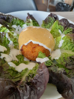 Una foto de Bomba rellena de pato y mozzarella