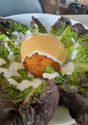Una foto de Bomba rellena de pato y mozzarella