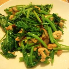 A picture of Stir-Fried Ong Choy (Chinese Water Spinach) with Leftover Chicken Skin.