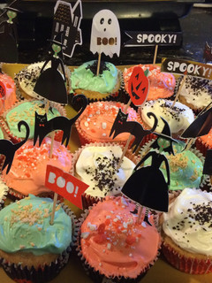A picture of Pumpkin Spice Cupcakes with Cream Cheese Frosting.