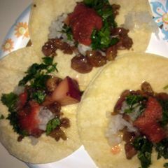 A picture of how to prepare and cook beef intestines for tacos.